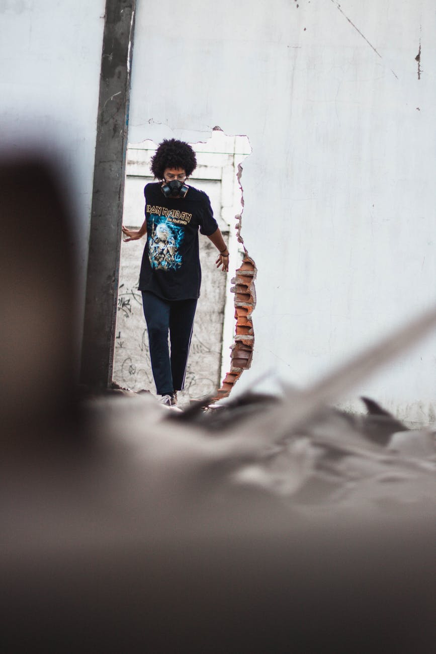 man standing near doorway